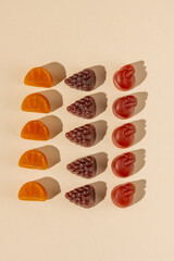Multivitamin gummies, fruit shaped. Healthy food supplement concept.