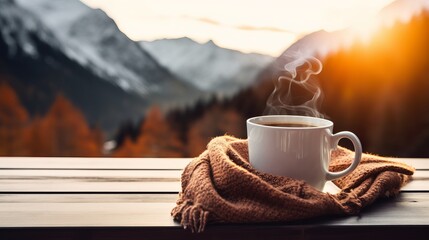 The woman relaxes by the mountain view with a cup of hot drink while wearing woollen socks. - obrazy, fototapety, plakaty