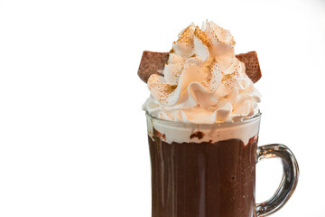 Hot chocolate with whipped cream and golden edible glitter in a transparent cup. Transperent background and text space.