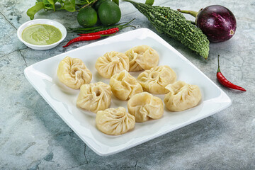 Nepali steamed dumplings  Momo with sause