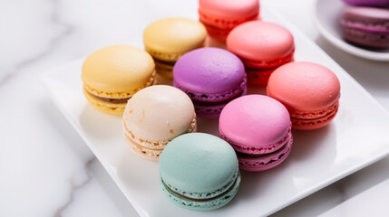 Obraz premium A macro view of a stunning array of macarons atop a marble countertop offers a visual feast for food and sweet connoisseurs.