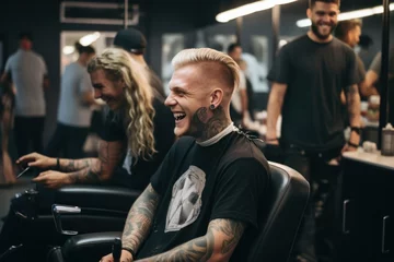 Foto op Aluminium Caucasian man sitting at a barbershop getting haircut smiling © blvdone