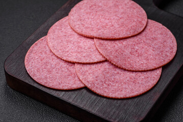 Delicious smoked salami sausage with salt, spices and herbs