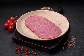 Delicious smoked salami sausage with salt, spices and herbs