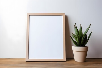 Blank white frame with plant pot isolated mock up on white background