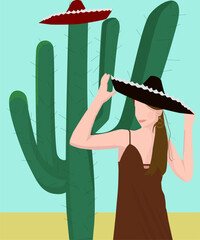 Girl in a Mexican  sombrero against the background of a cactus