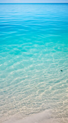 blue ocean merging into a beach