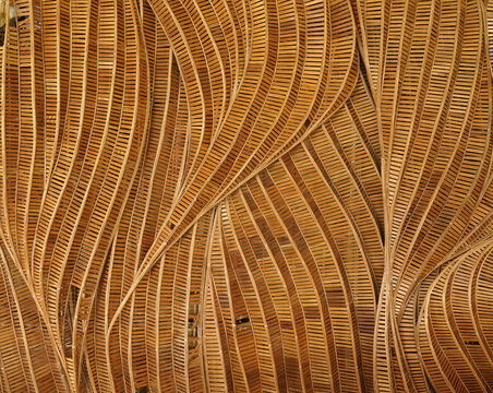 abstract curve pattern that twists and turns smoothly and flows like water waves Made from woven bamboo For building decoration in a modern tropical contemporary style or for making furniture.