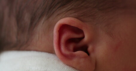 Newborn baby ear macro closeup
