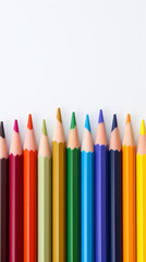 A vibrant assortment of colored pencils on a clean white surface