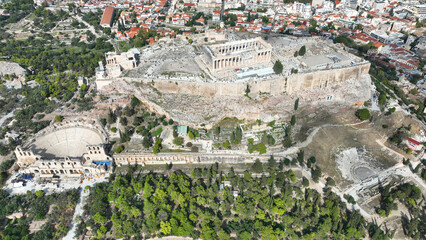 Aerial drone cinematic shot above unique Acropolis hill, the Parthenon, Odeon of Herodus Atticus...