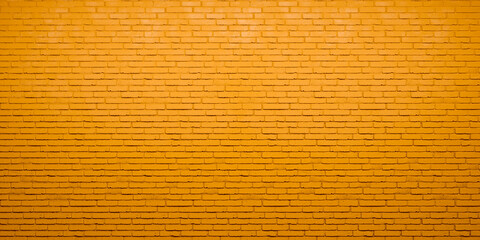 Brick wall texture in yellow paint background