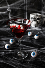 Bloody Martini cocktail for Halloween party, selective focus