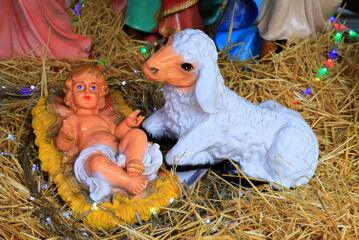 Nativity of Jesus Christ, nativity scene near church, baby Jesus. Christmas and New Year decorations