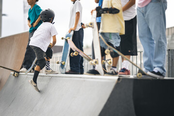 Skater maneuvering with one foot on board.