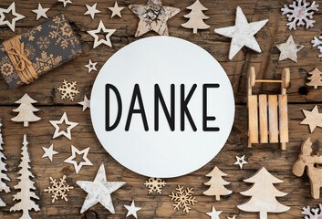 Text Danke, Means Thanks, On Wooden Background, Natural Christmas Decoration