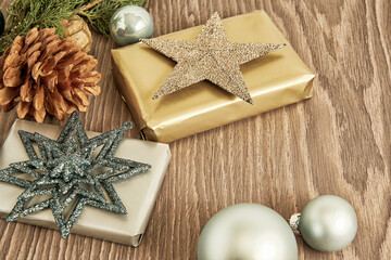 Banner with Christmas gifts boxes, decorative stars and toys and festive ornament. Happy holidays theme backgrounds