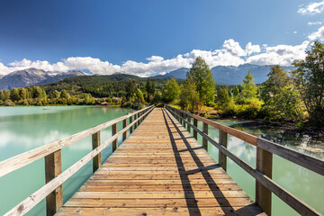 The Whistler Green Lake Promenade is a boardwalk over the green glacier water of Green Lake in the village of Whistler in British Columbia, Canada.
