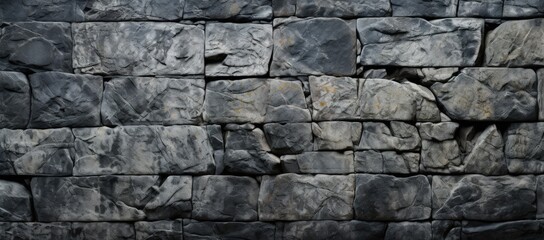 Obraz premium A backdrop featuring a textured and aged stone surface