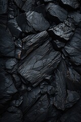 The background has a textured appearance reflecting the obsidian-like properties of basalt