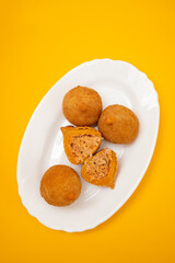 traditional fried coxinha on a plate