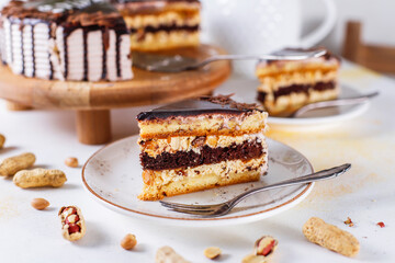 Snickers cake with caramel, peanuts and buttercream.