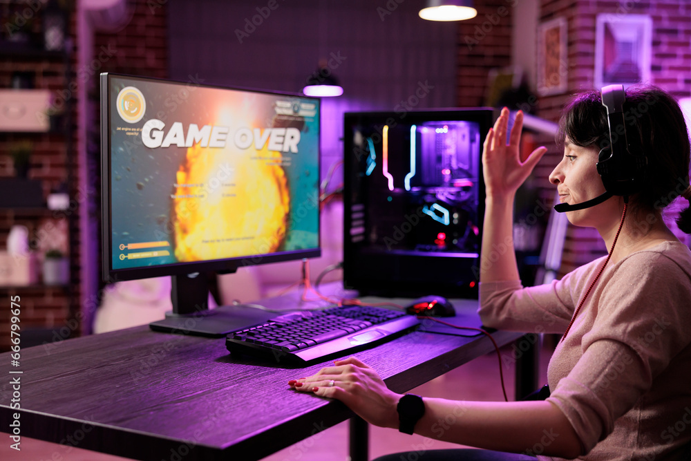Poster frustrated gamer losing singleplayer spaceship arcade racing videogame, seeing game over screen on g