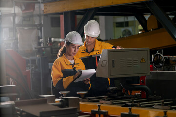 Professional quality control inspector conduct safety inspection on steel machinery and...