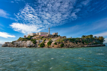 A scenic view of Alcatraz Island from the ferry in San Francisco Bay. 