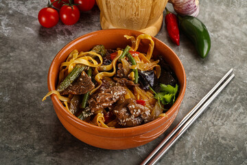 Asian wok with noodle, vegetables and beef