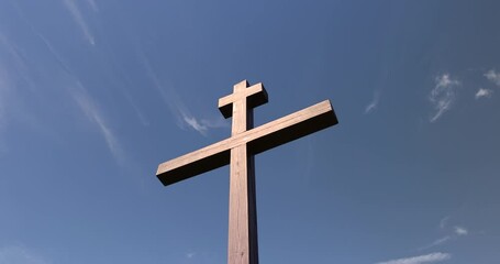 wooden christian cross on a blue sky background, wooden orthodox cross on a sky background with clouds
