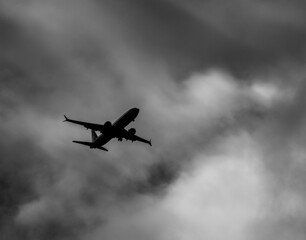 Silhouette of a Jet Airliner on Landing Approach in Black and White.