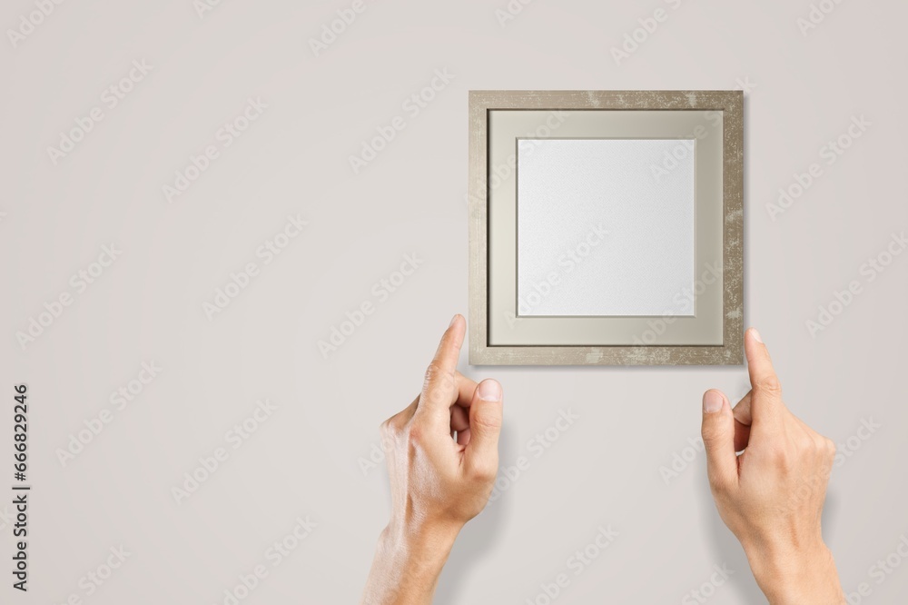 Poster Woman hands hanging wooden frame