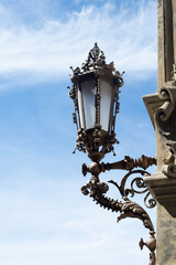 Fototapeta na wymiar Gothic old lamp and sky