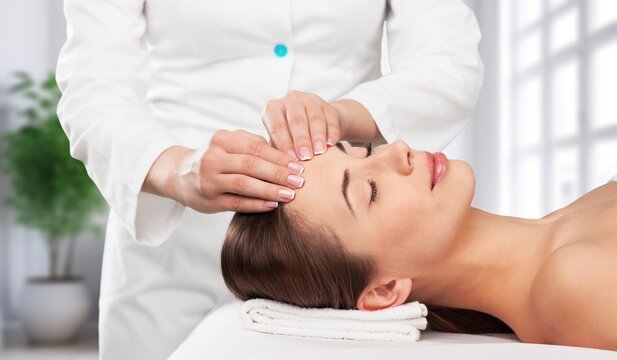 Shot of a young beautiful woman enjoying massage at salon, AI generated image