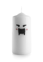Wax candle for Halloween on white background