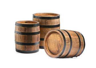 Set of many wooden barrels on white background