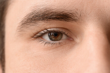 Young man with hazel eyes, closeup