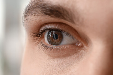Man with brown eyes, closeup