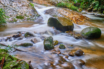 Natural water stream and rocks