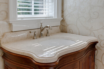 Classic Bathroom with Carved Wooden Vanity Sink, Silver Vintage Faucets, Natural Stone Countertop,...