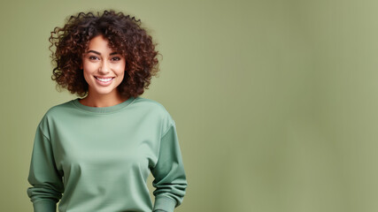 Fototapeta na wymiar Afro american woman wearing green sweatshirt isolated on pastel