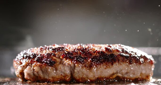 Fried vegetarian cutlets made from vegetable protein. Cinematic advertising plant-based imitation burger cooking. Pan-fried vegetarian cutlets delicious and healthy alternative to meat. Soy protein