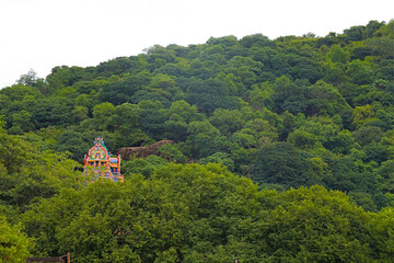 hindu temple in a green mountain 