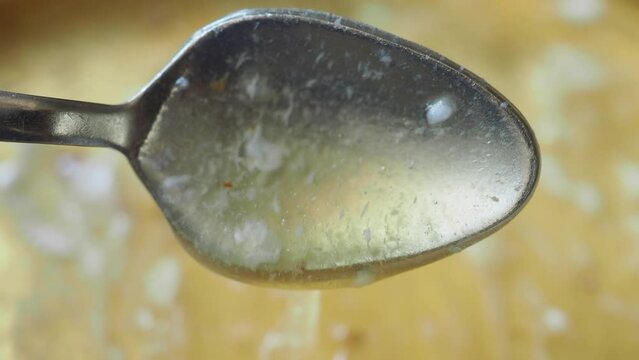 top view of spoon pick fresh honey