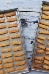 Rows of Indonesian cakes called kastangel on a table ready to serve