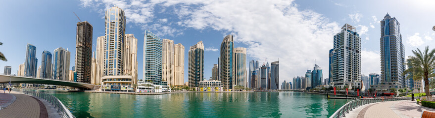 Huge high-rise buildings surround the marina in the Dubai city, United Arab Emirates