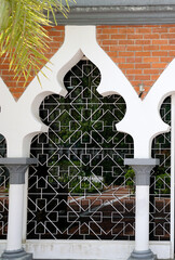 Beautiful geometric design on the screen windows at Jamek Mosque in Kuala Lumpur, Malaysia on...