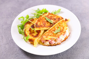 Fried crepe with ham and cheese