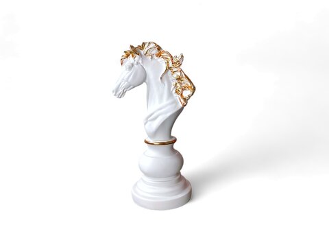 miniature white chess horse on a white background